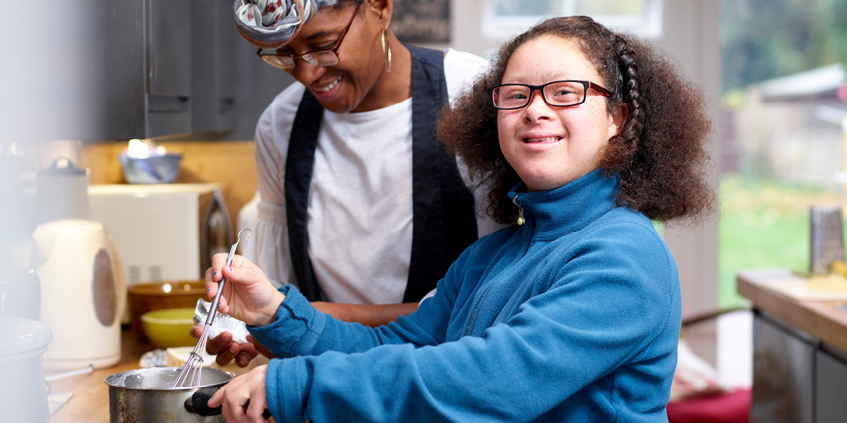 Adult and child baking